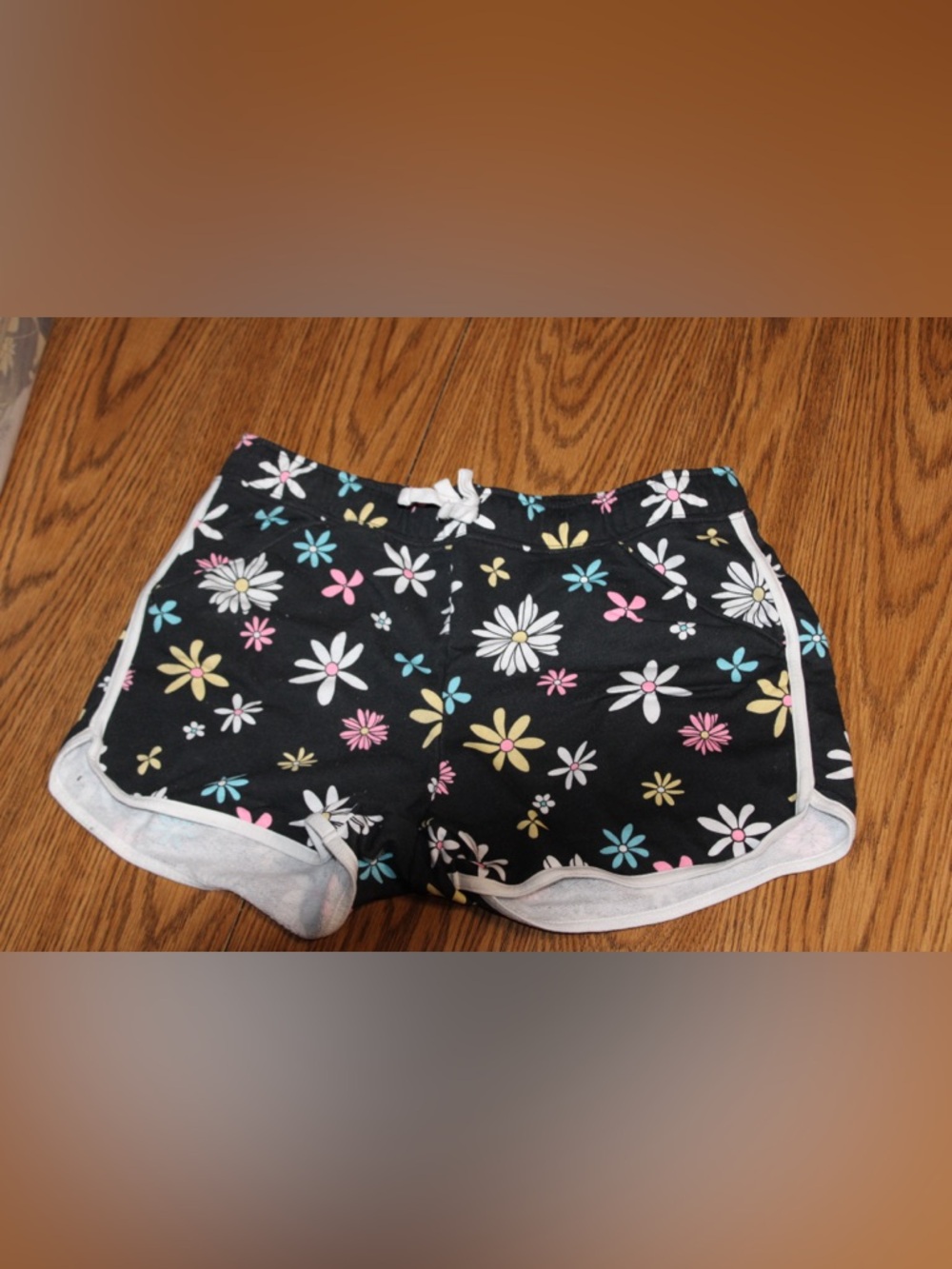 Justice Black Daisy Print Lounge Shorts with Pink, Yellow & Blue Flowers